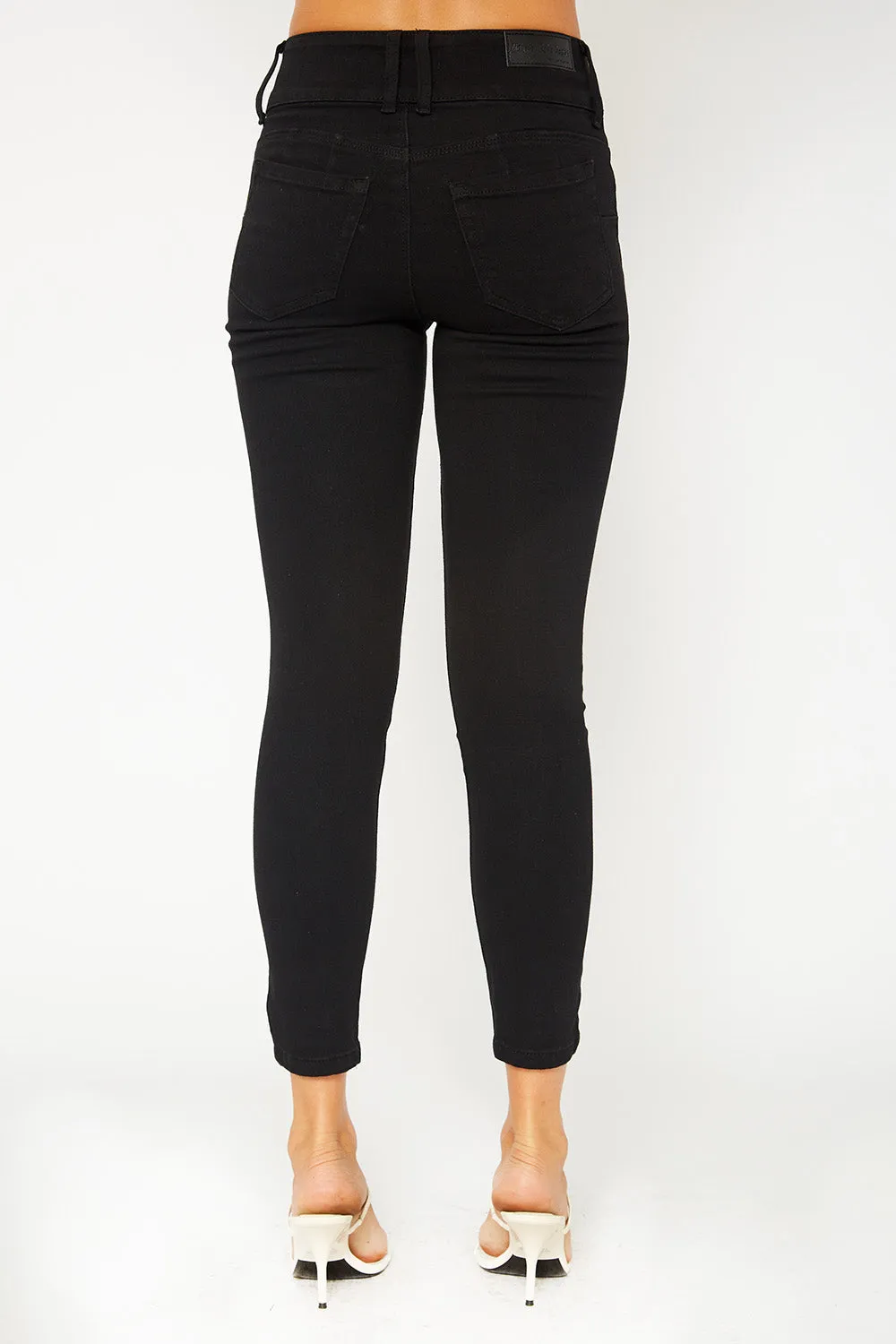 High-rise three button black skinny pants
