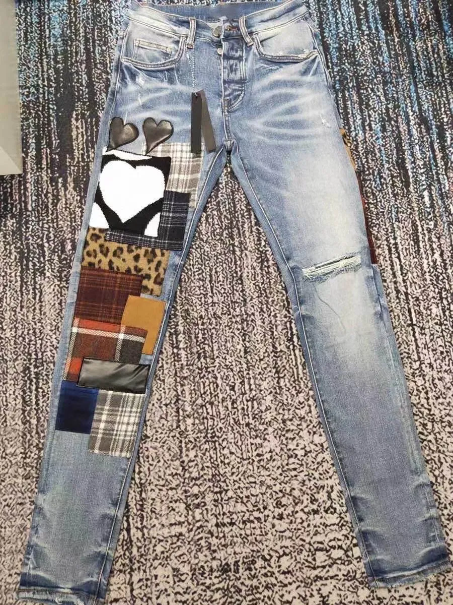 men art patches distressed blue jeans