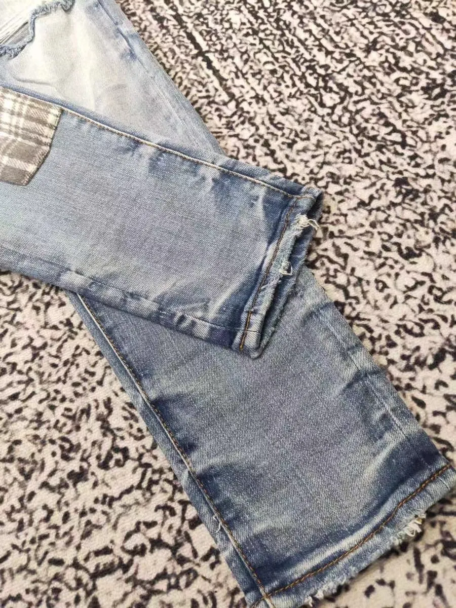 men art patches distressed blue jeans