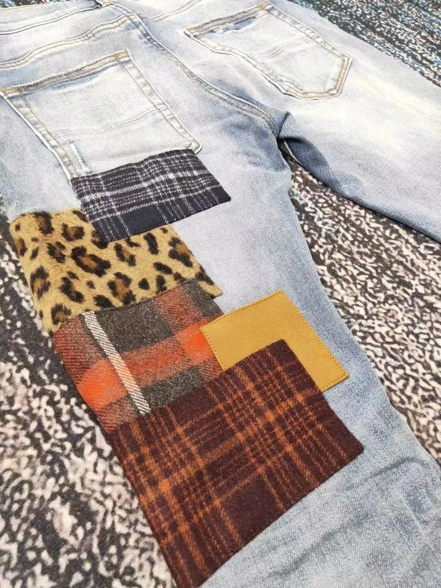 men art patches distressed blue jeans